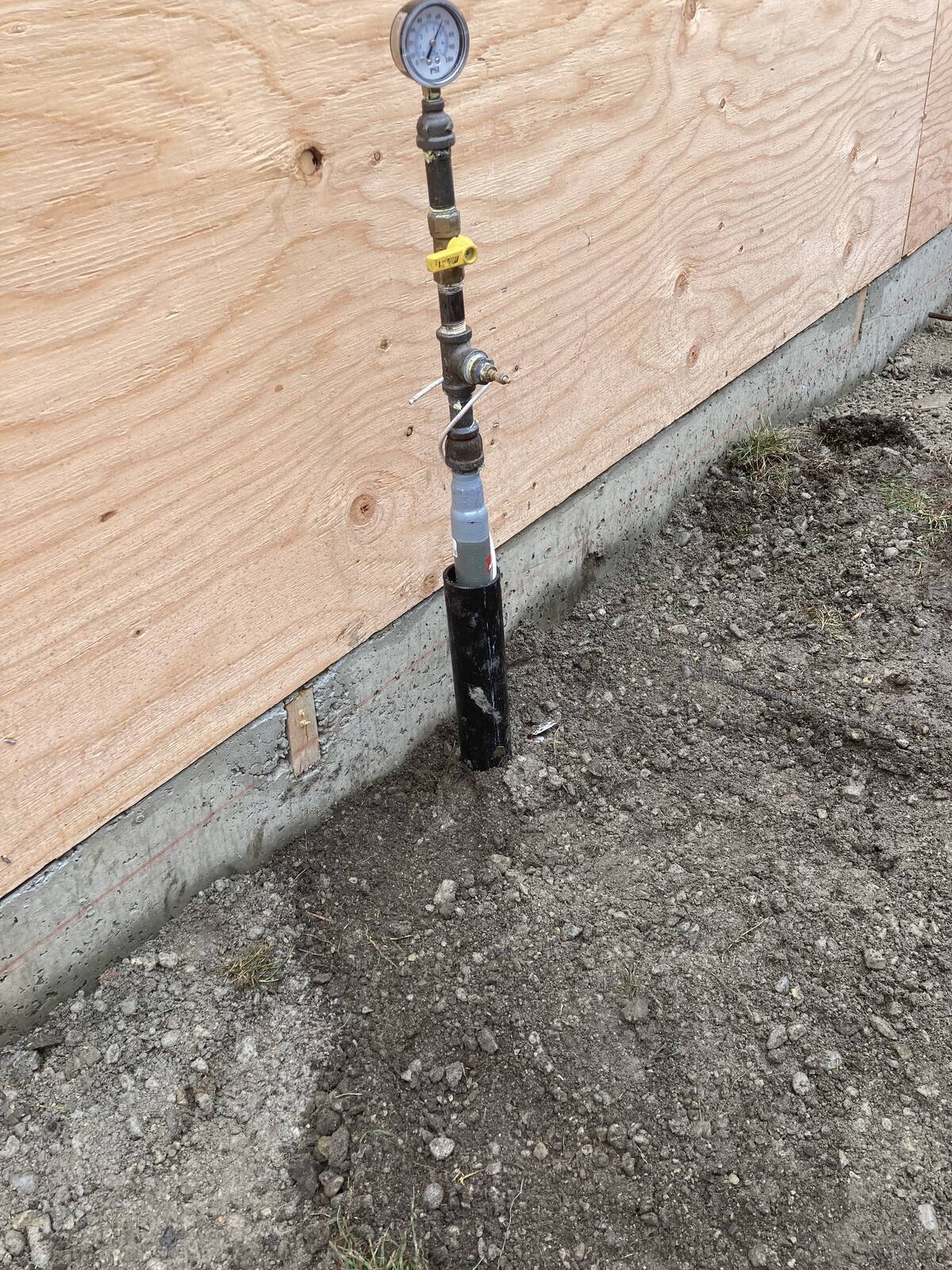 Hot water tank utility room retrofit project in Calgary